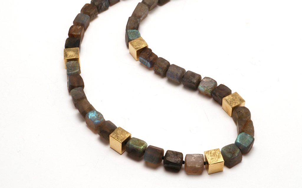 8105N - Necklace of Labradorite beads accented with 18 karat gold beads. (10.8g) Price Upon Request