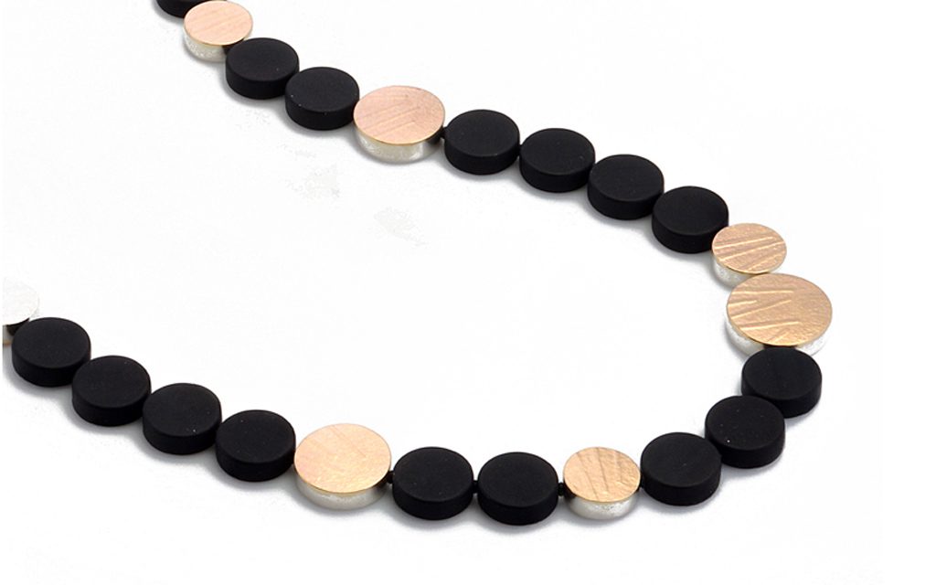 8113N - 14 karat gold, Sterling Silver and Onyx necklace. 22 and 18" in length Price Upon Request